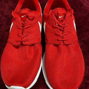 Nike Bold Red Athletic Shoes
Size 7Y  or 8.5 in women’s. 
In great shape!